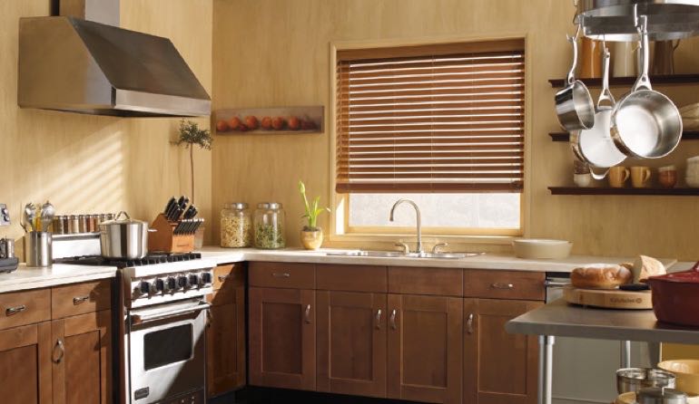 Minneapolis kitchen faux wood blinds.